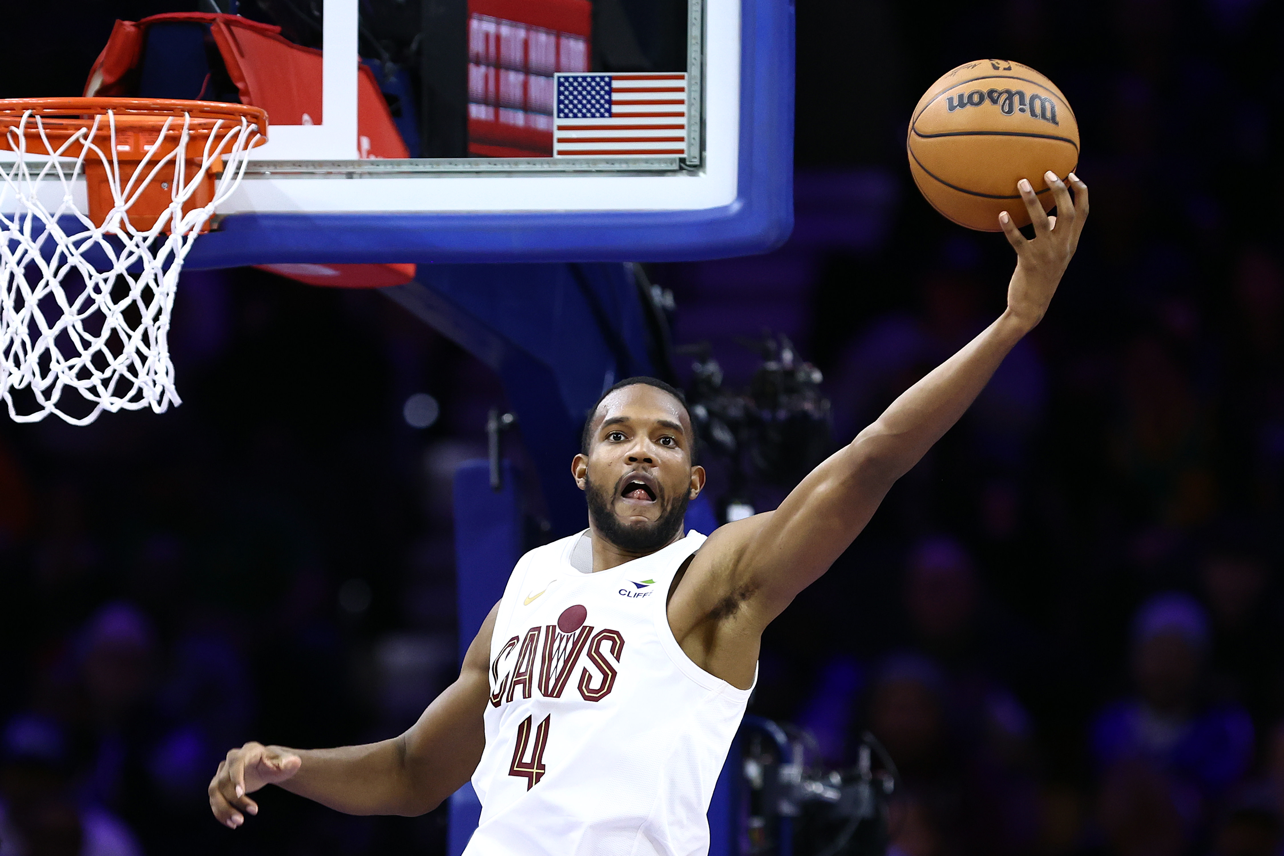 Evan Mobley reaches for a rebound. 