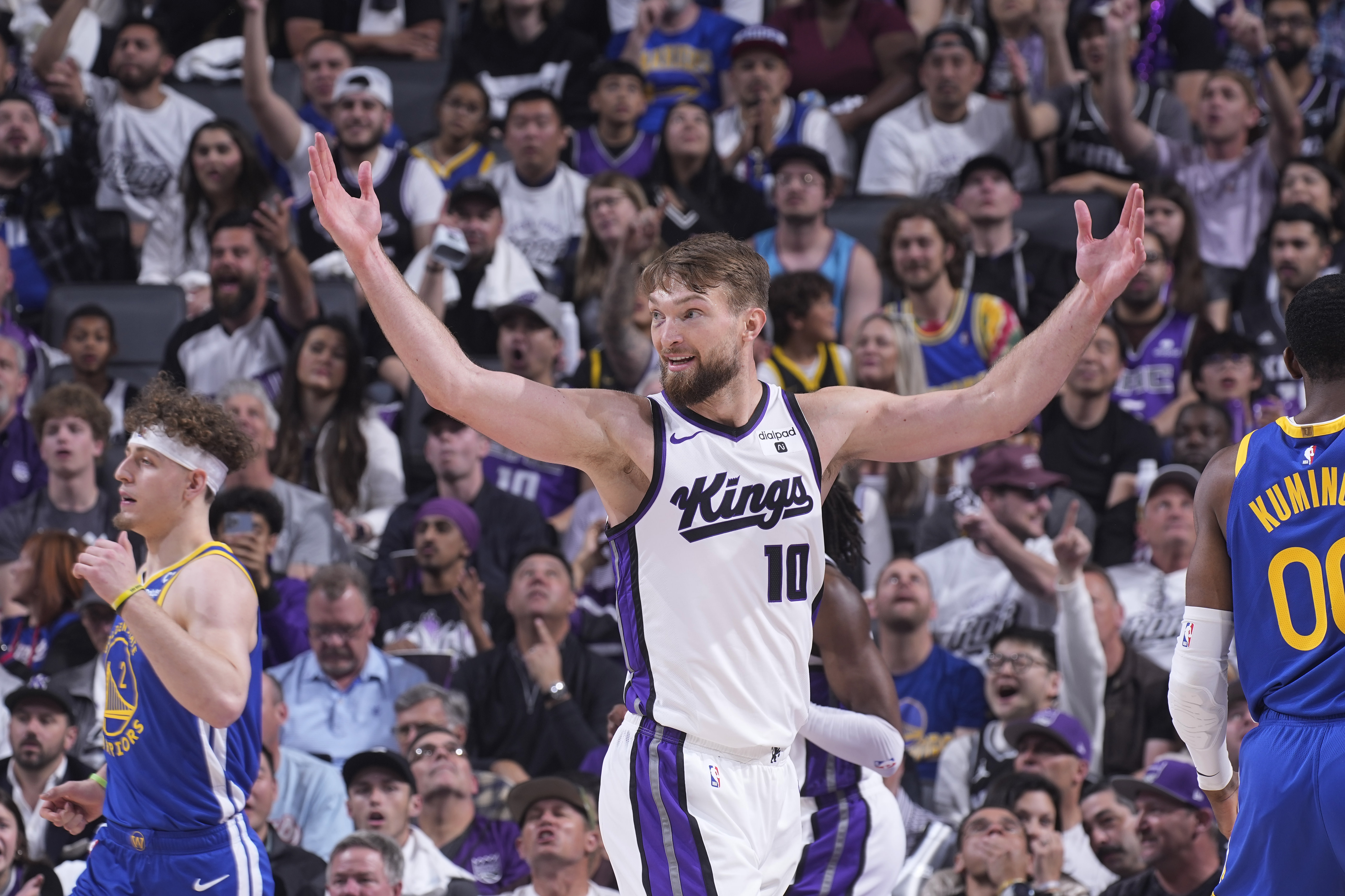 Domantas Sabonis reacts during a play-in game in April 2024. 