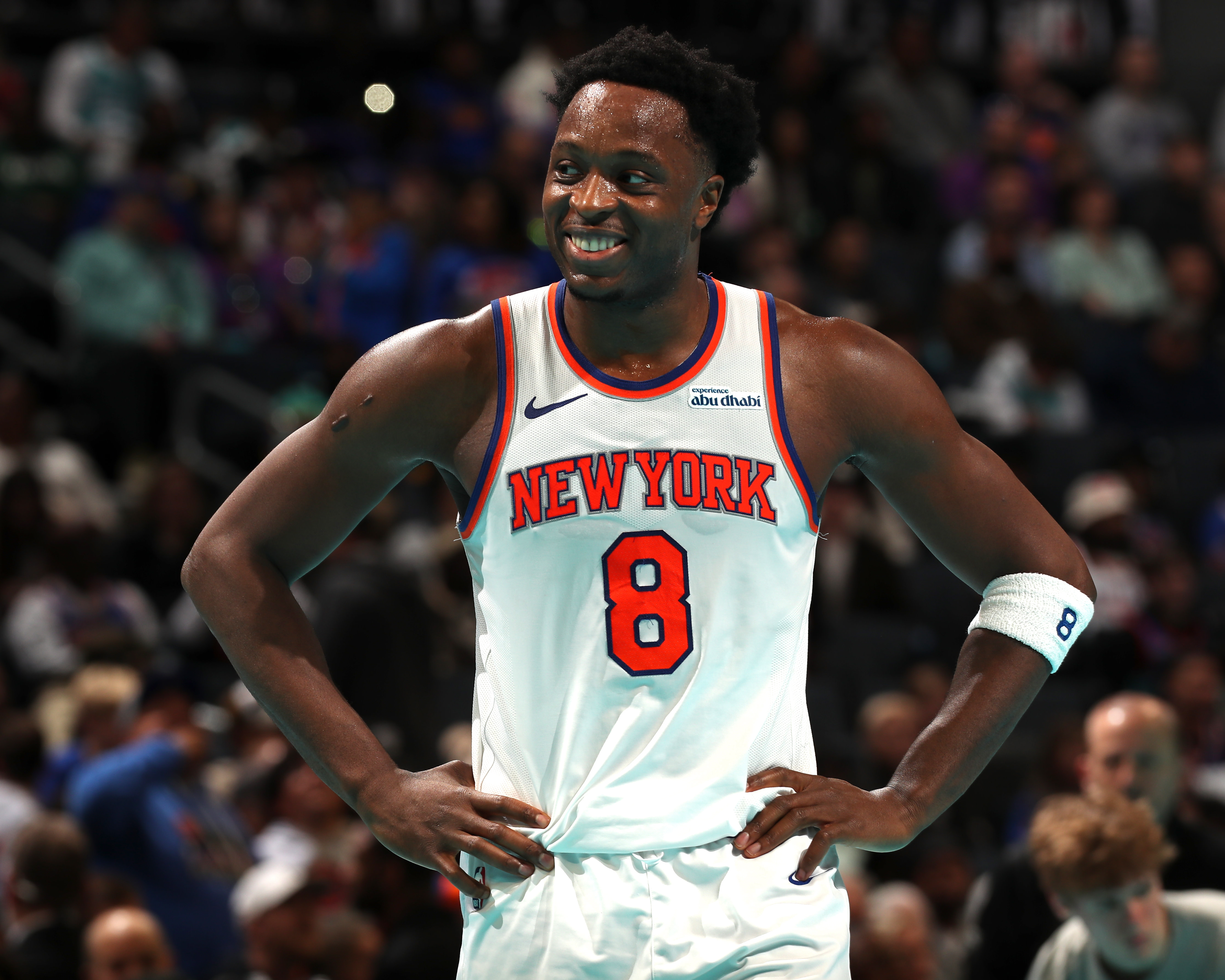 OG Anunoby smiles during a game.