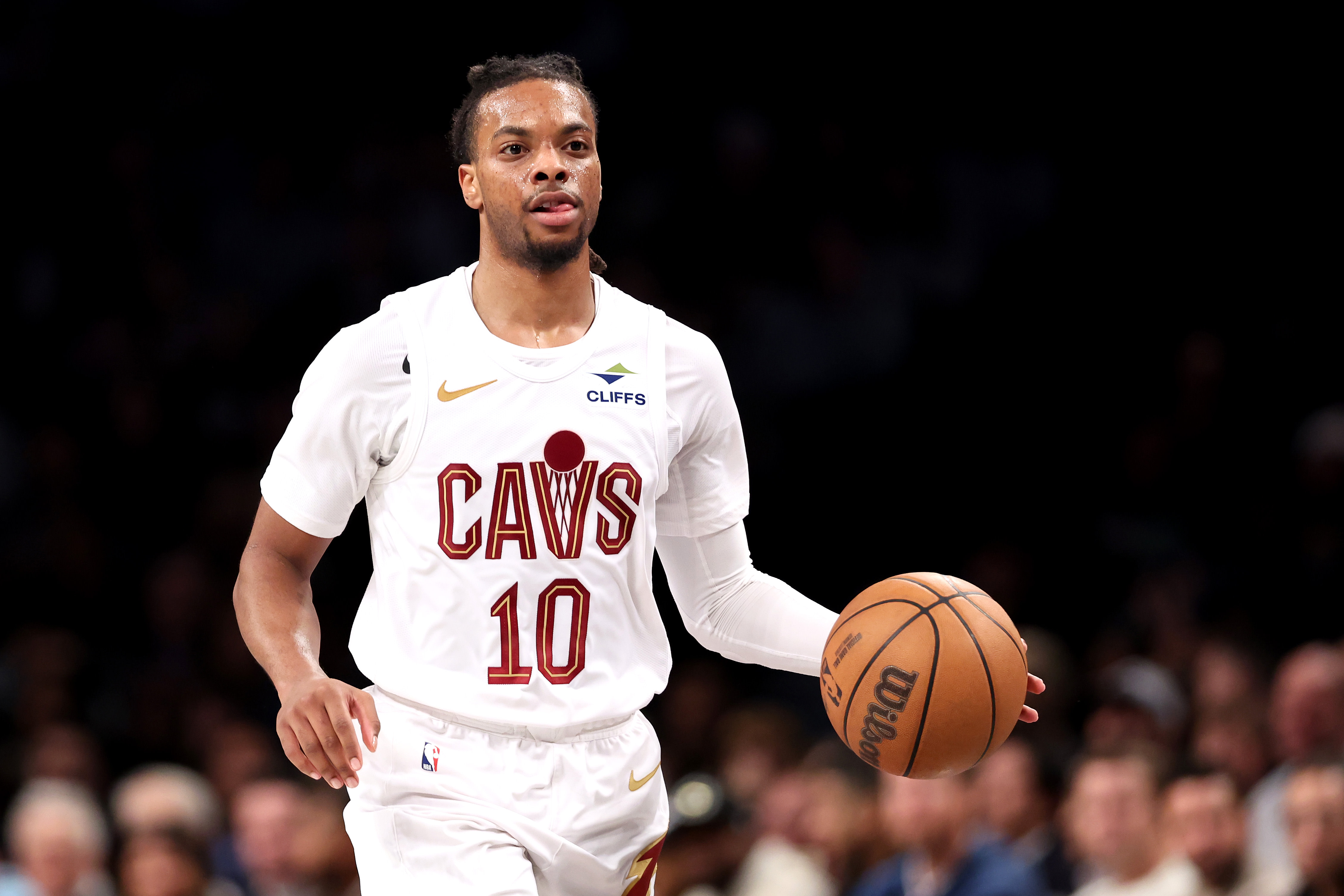 Darius Garland dribbles up the court during a game in 2024. 