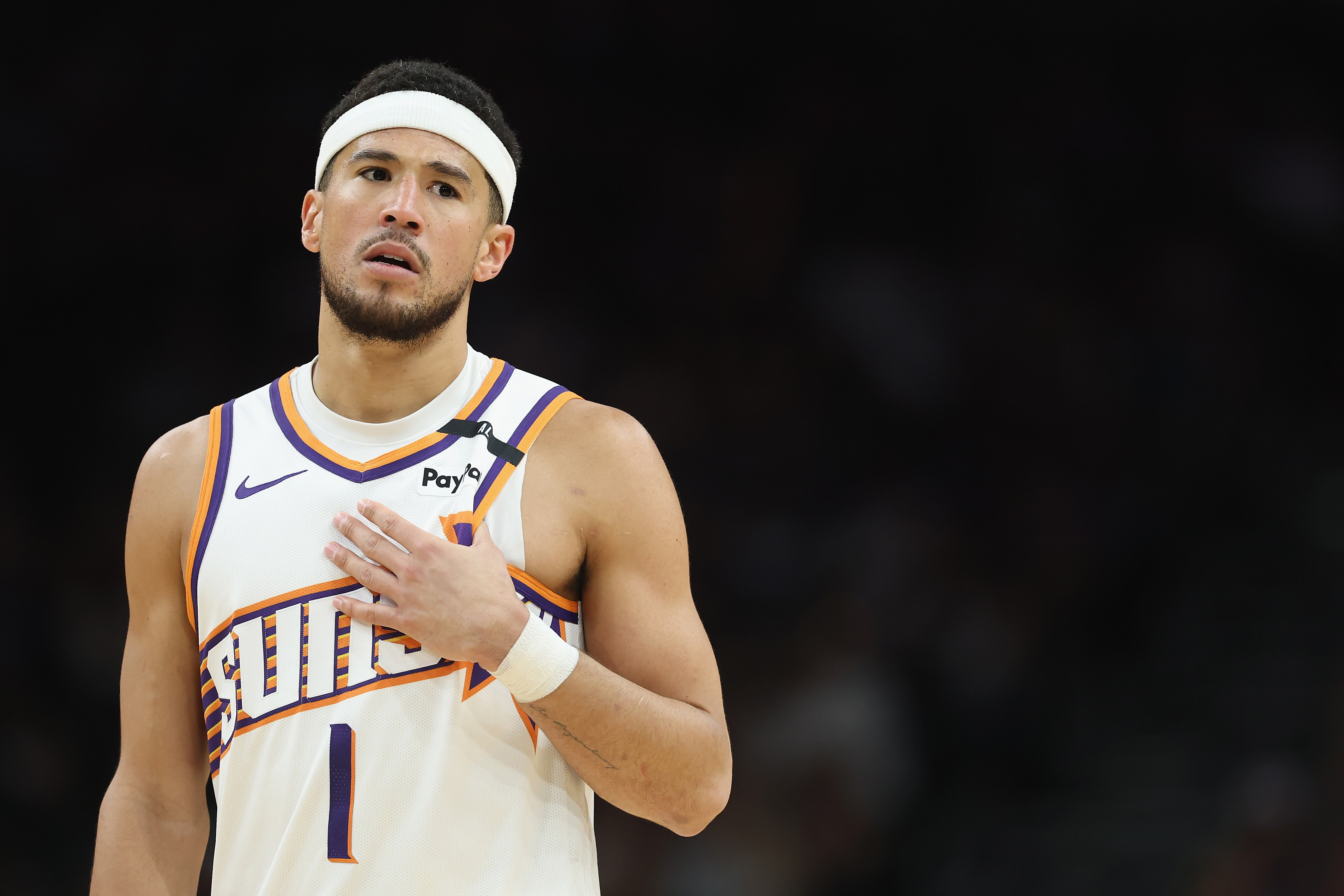 Devin Booker looks on during a game in April 2025.