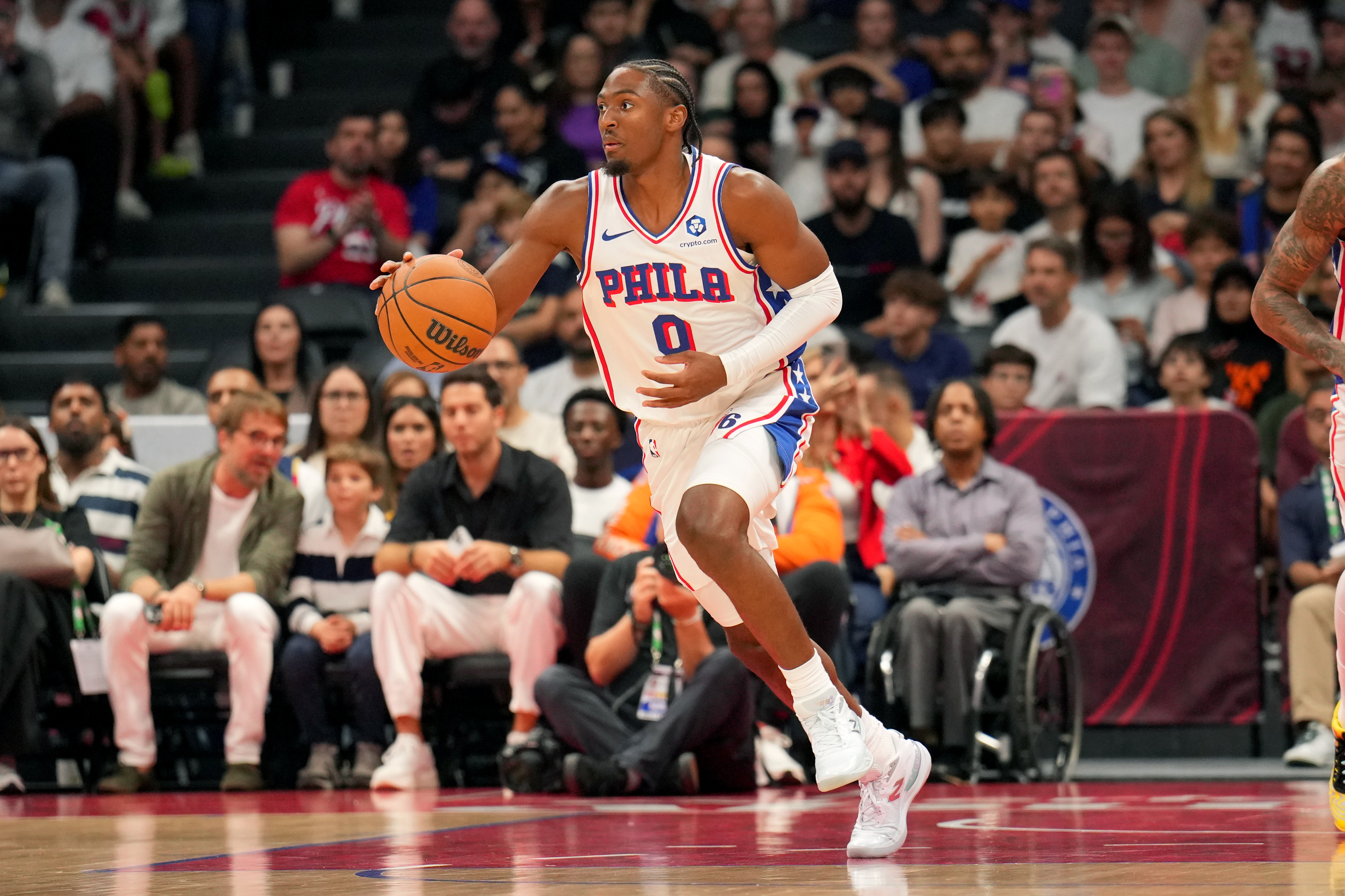 Tyrese Maxey drives the lane during a preseason game. 