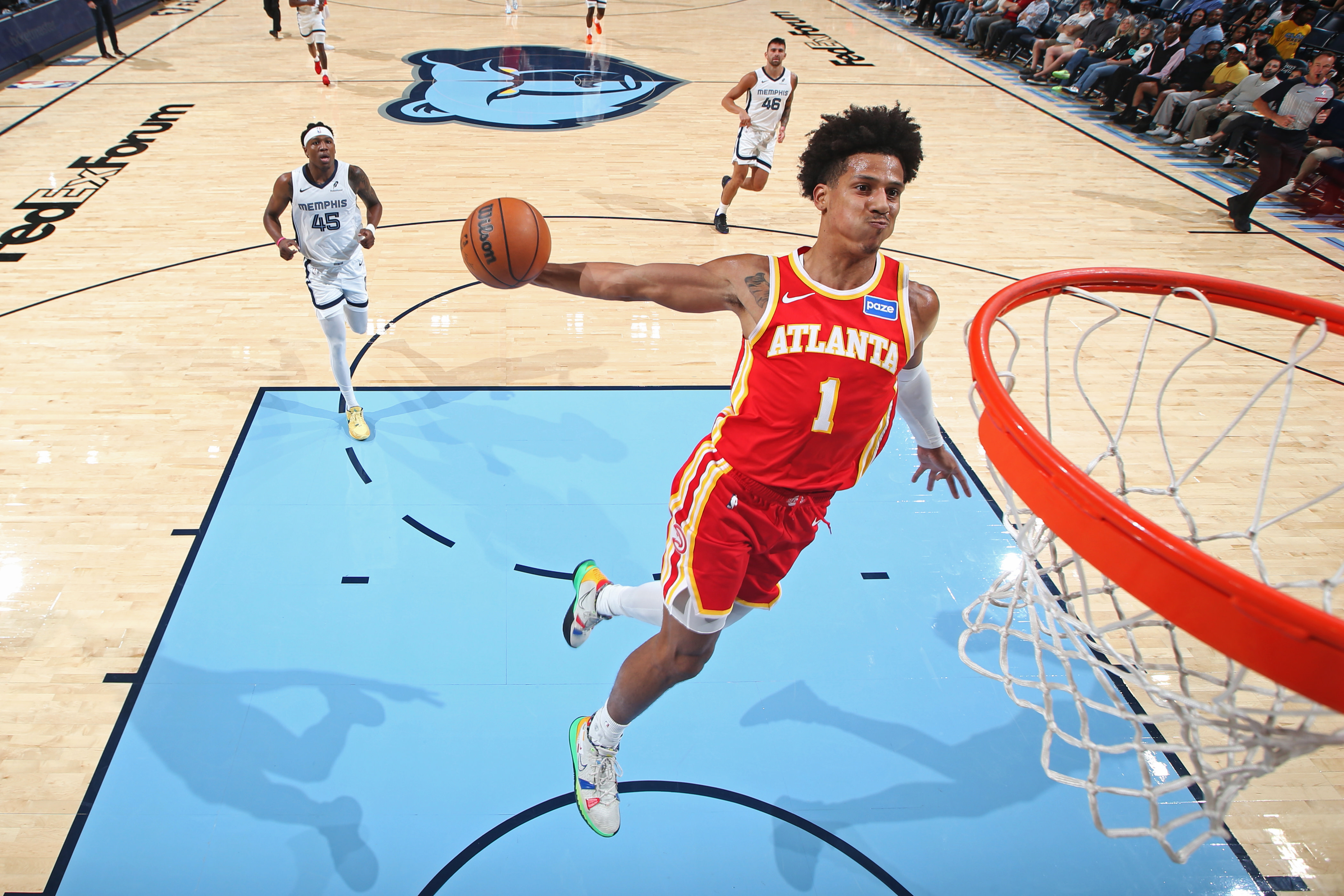 Jalen Johnson swoops in for a dunk. 