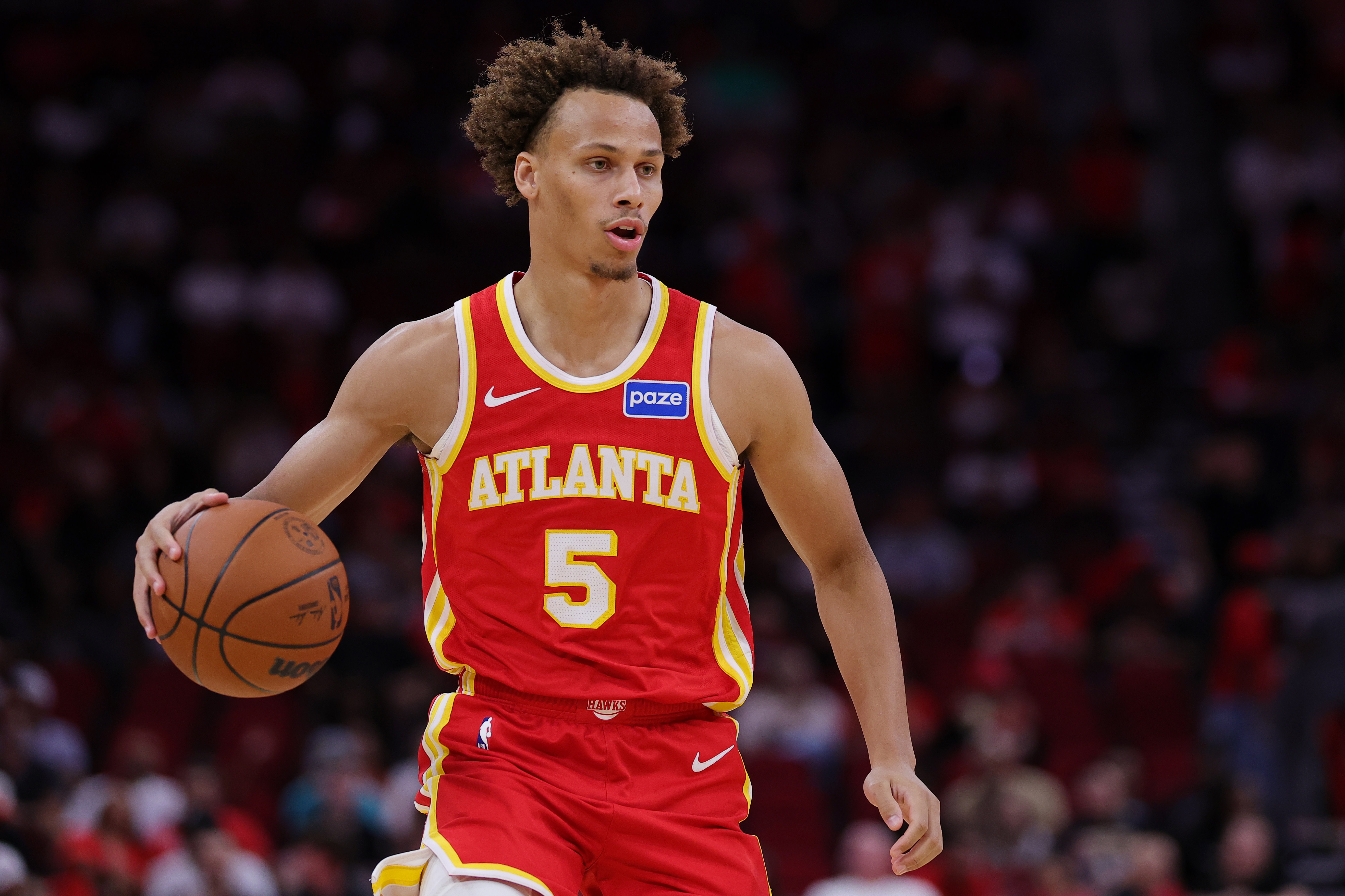 Dyson Daniels dribbles the ball up the court. 