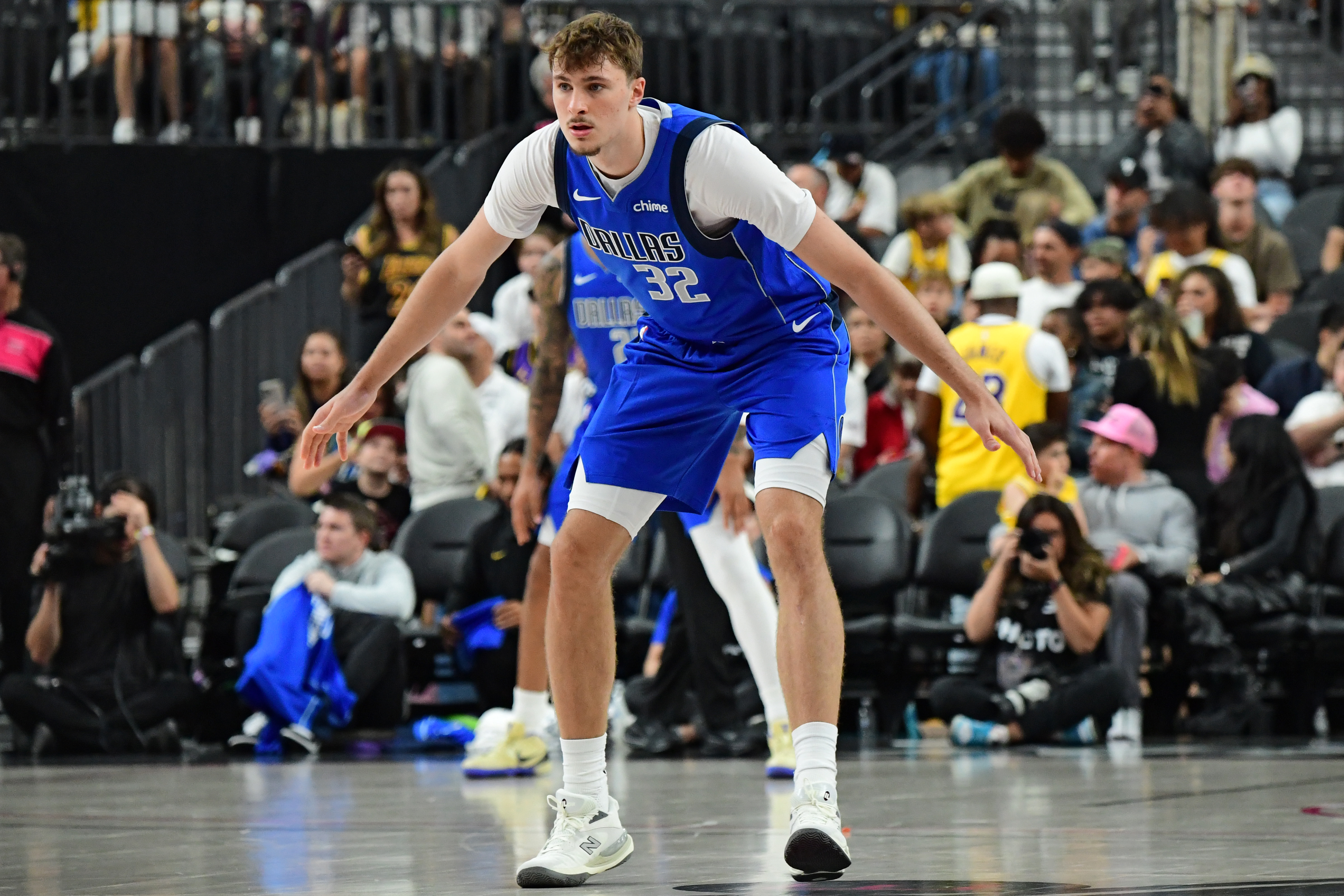 Cooper Flagg plays defense in a preseason game. 