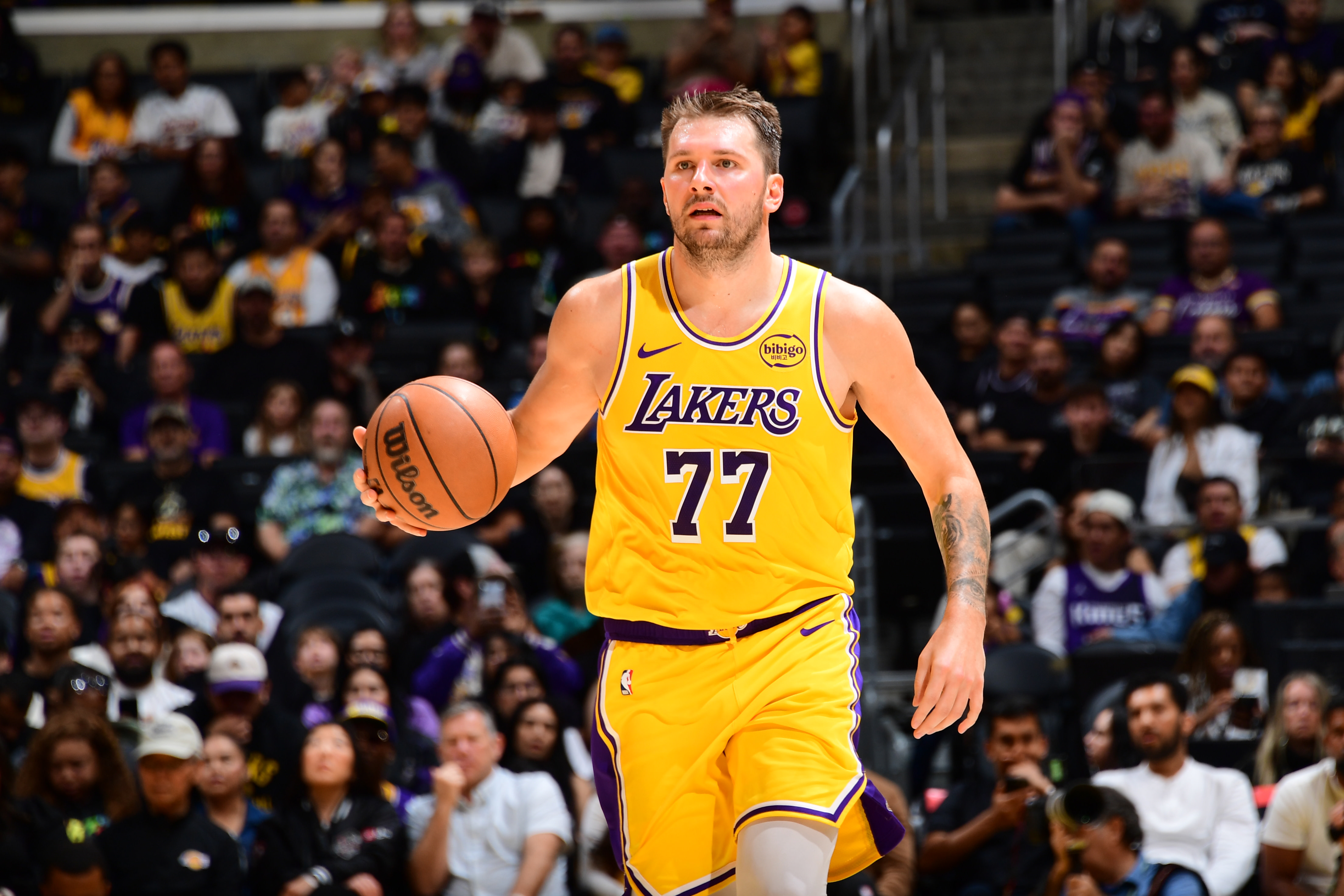 Luka Doncic dribbles up the court. 