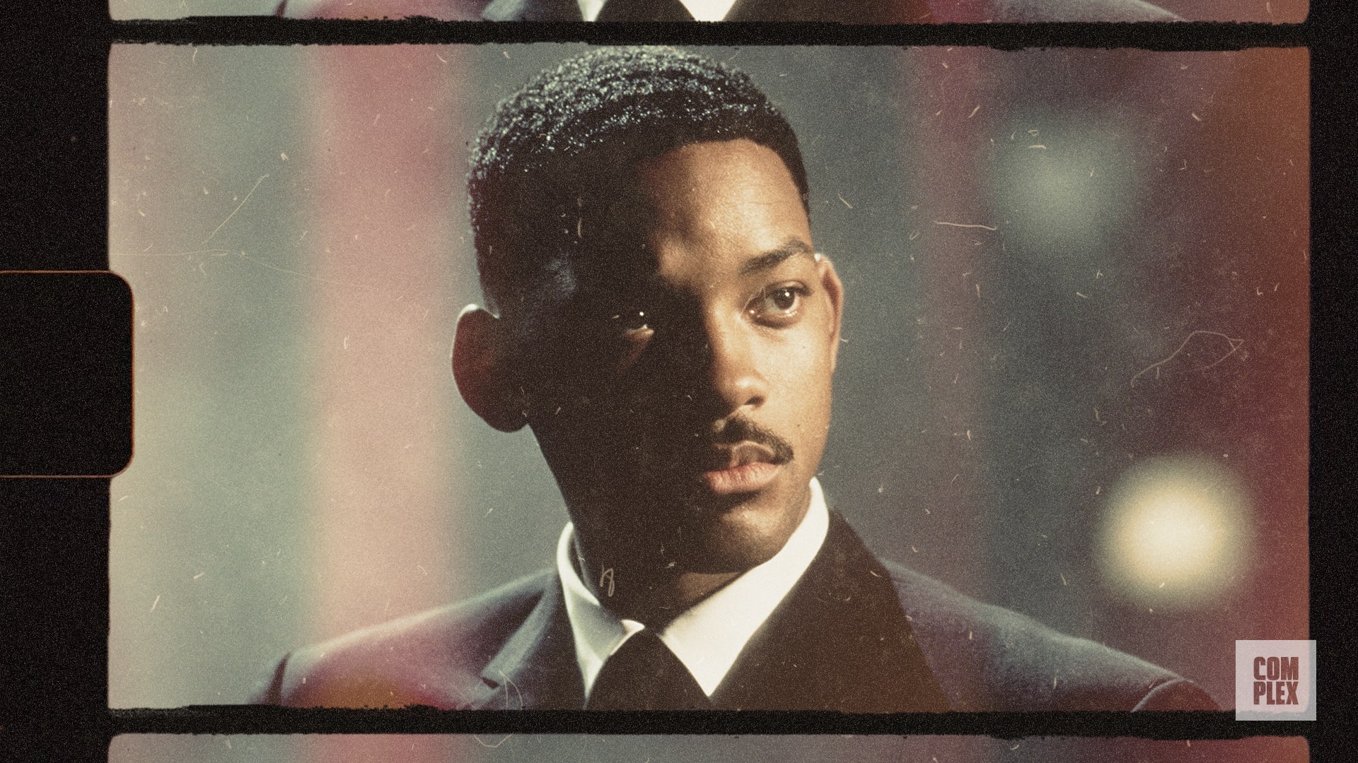 Will Smith in a suit, looking to the side, with a vintage film effect.