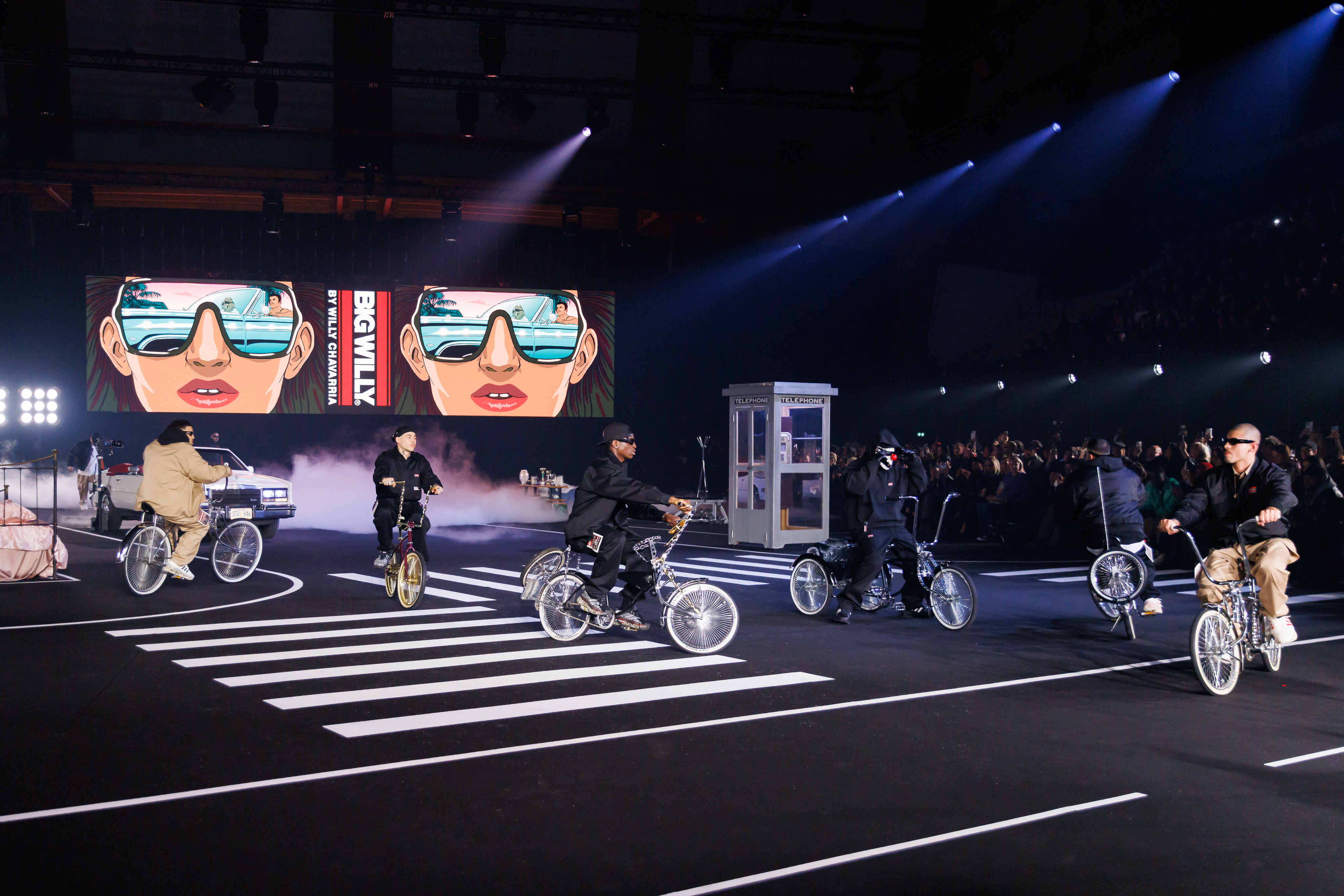 The Dojo de Paris was transformed with vignettes like a phone booth, a men’s and women’s bedroom, white street lines, and an old white Cadillac for Willy Chavarria Fall/Winter 2026.