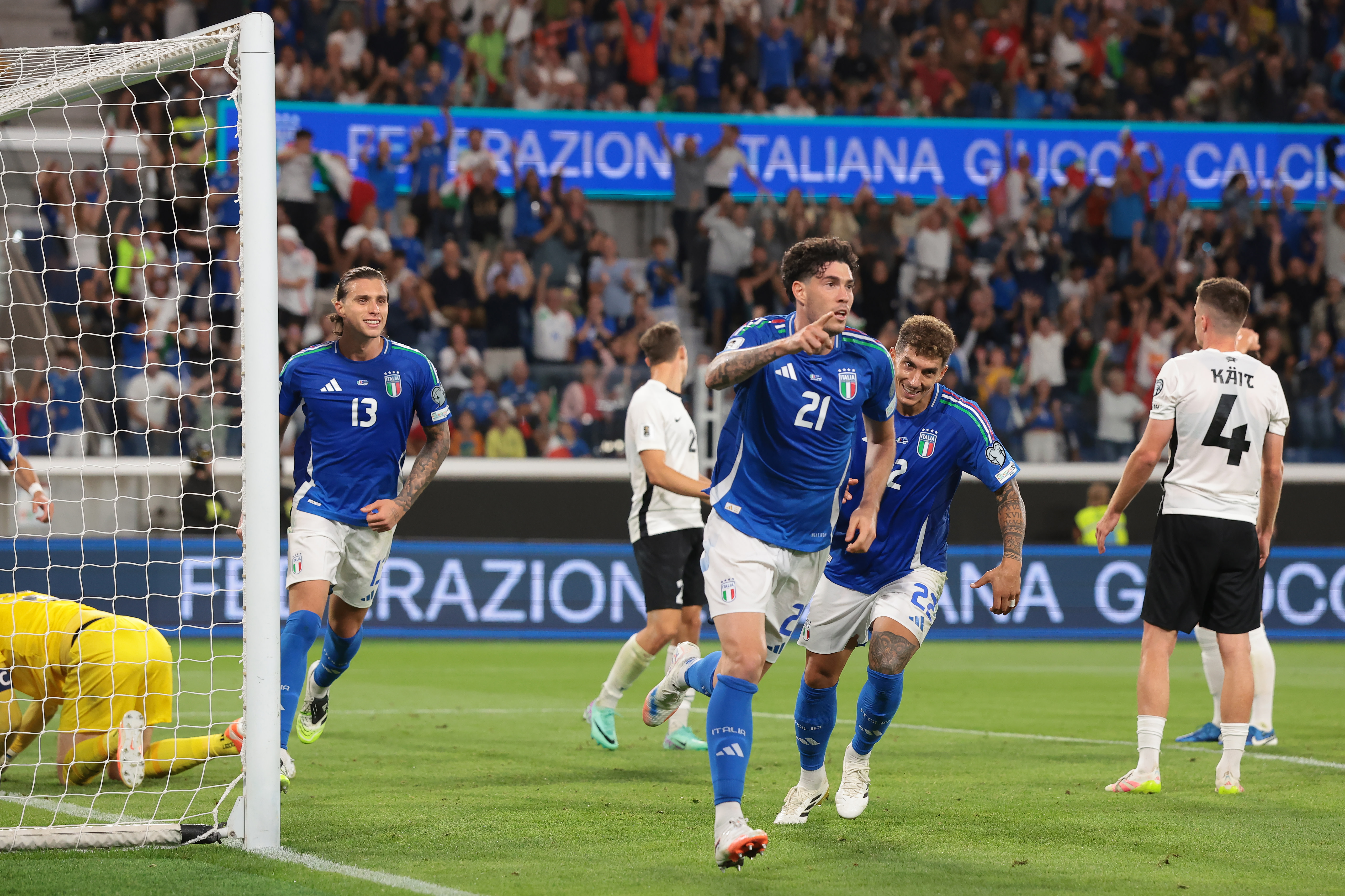 Alessandro Bastoni celebrates after scoring a goal during a FIBA World Cup qualifying match between Italy and Estonia. 