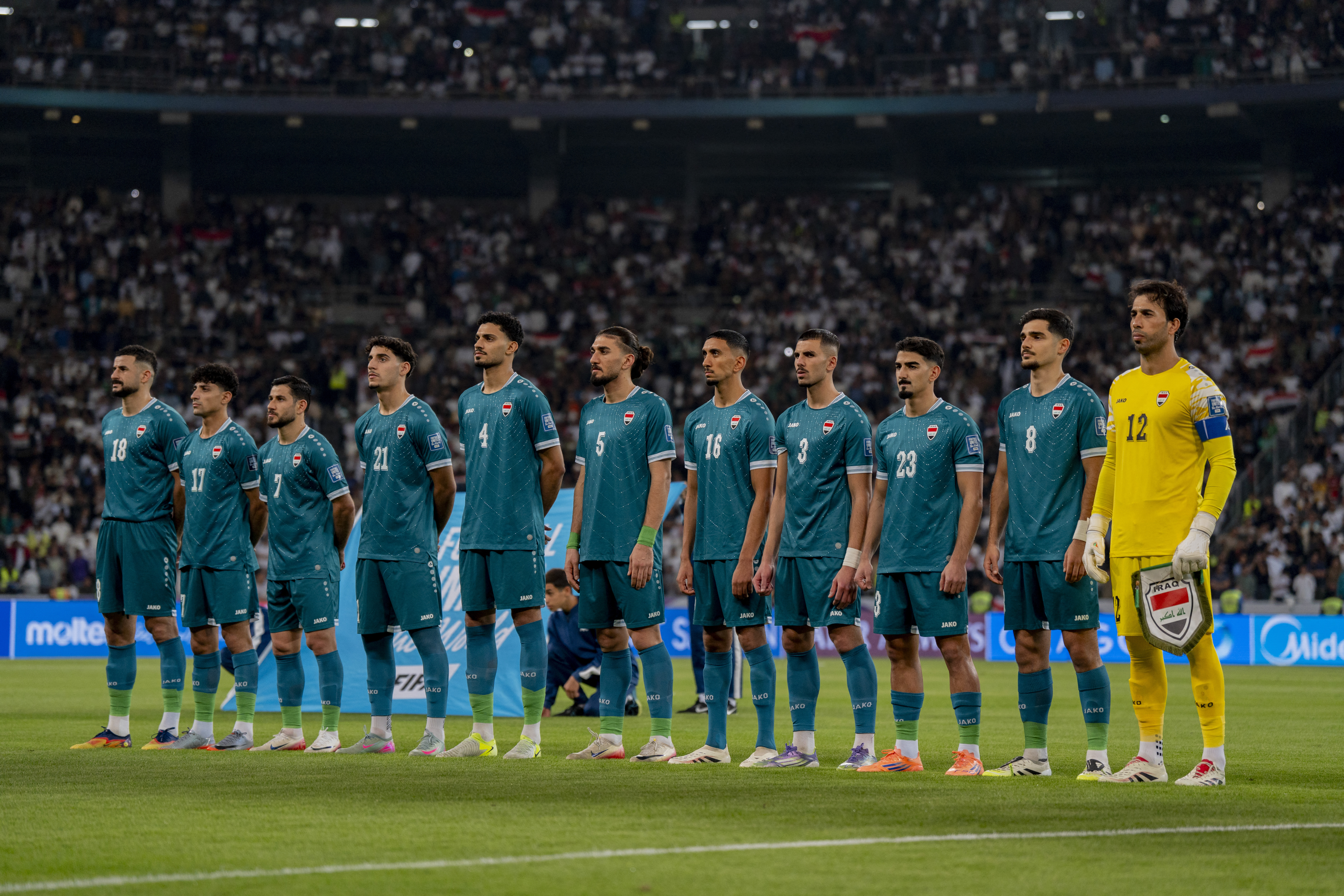 The Iraqi teams lines up prior to their World Cup qualifying match with Saudi Arabia. 