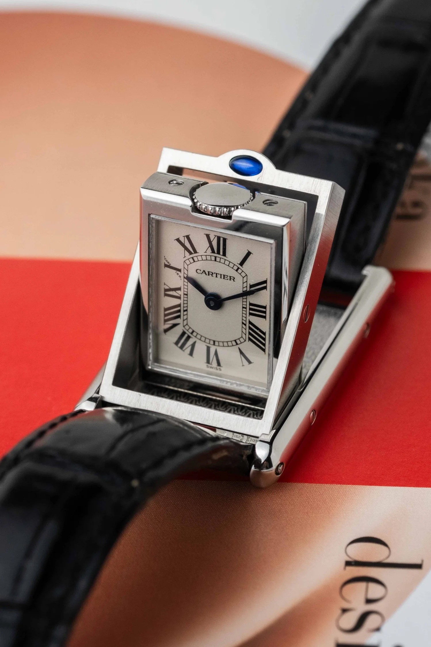 The Cartier Tank Basculante stands out for its protective tilting mechanism.